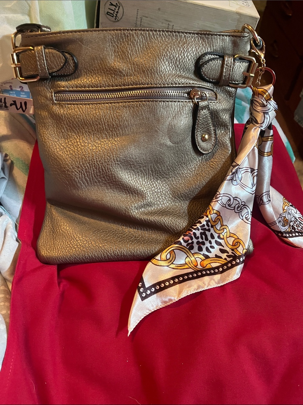 Metallic Gold Crossbody Bag with Decorative Scarf
